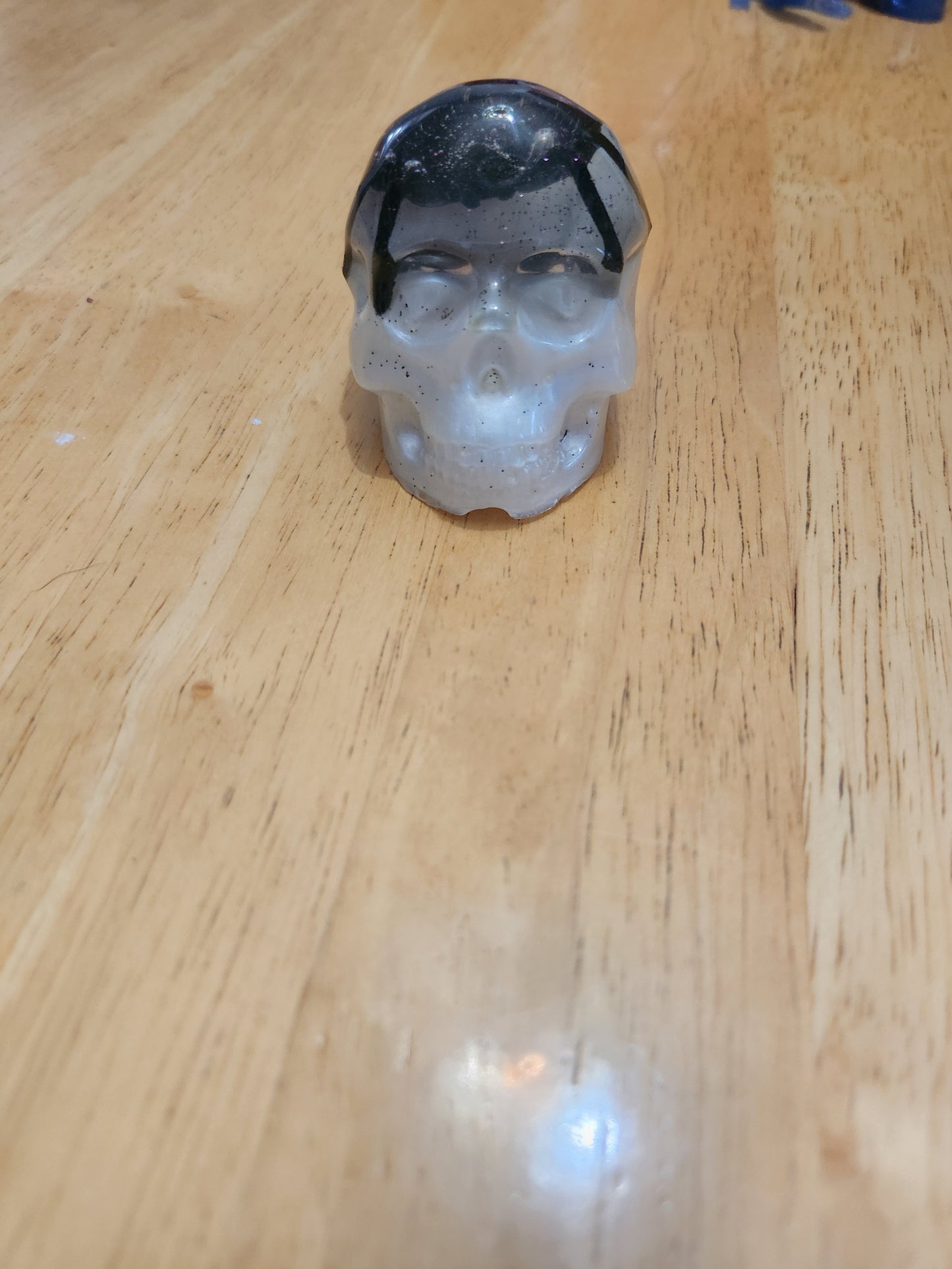 Medium skull with spider