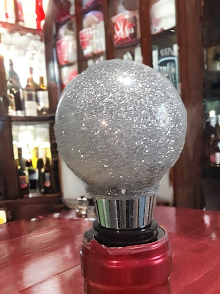 Silver sphere bottle stopper