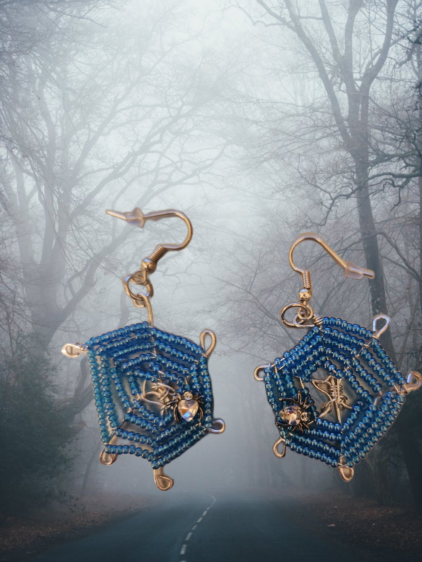 Blue spider web earrings