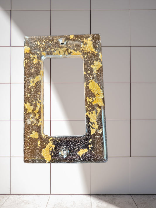 Gold flake switch plate