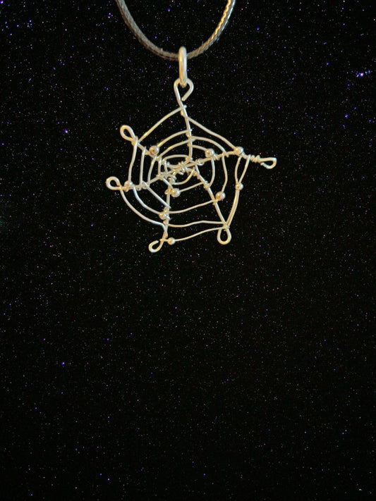 Silver spiderweb pendant