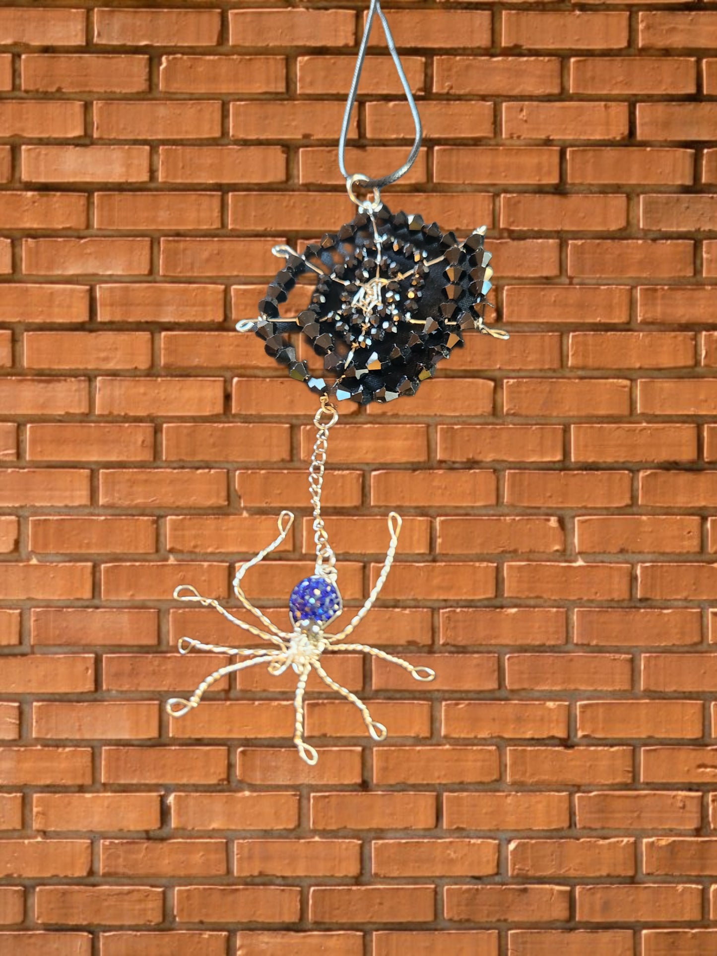 Spiderweb and spider pendant