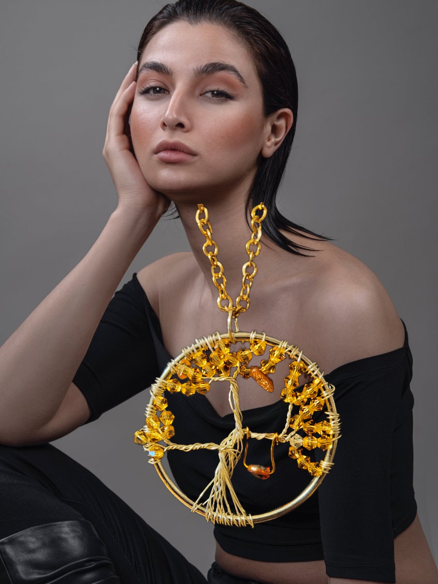 Gold toned tree of life necklace